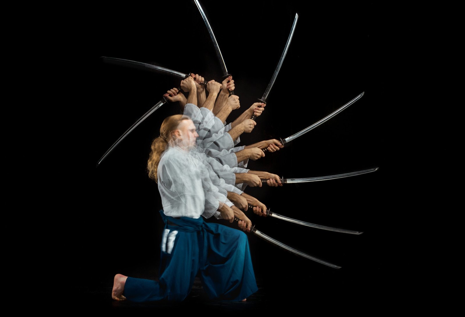 the young man are training aikido at studio